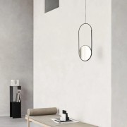 okragle-lustro-w-czarnej-ramie-mobile-mirror-kristina-dam-studio-casa-carina.jpg